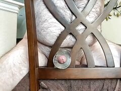 Cumshot fucking toy through chair