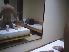 Transvestite with boyfriend in bed