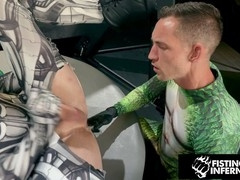 Hirsute hunk Brian Bonds gets spitroasted by jocks in costumes and fisted hard on FistingInferno