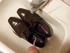 Piss in men's dress shoe