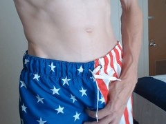 Jacob Brooke filling a condom and playing with it