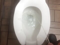 Peeing and then stroking it a little before going back to work