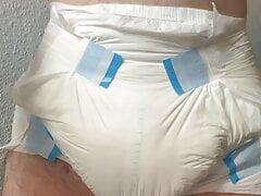 Diaper boy make big load of pee