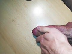 draining cumshot on the table