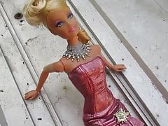 Golden Shower Barbie gets Pissed on Following Cum Shots