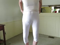 Male slut in tight spandex poses his fem ass and bulge