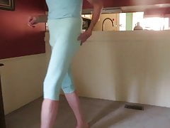 Crossdressing bitch in skin-tight leggings.