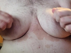 obese plays with his XXL bra-stuffers