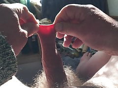 Foreskin in sun with: table tennis ball