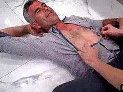 As stepson and dad practice some wrestling technologies on the floor, the boy perceives his stepdad’s erection growing against his caboose