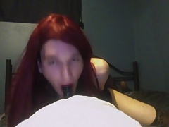 Crossdresser slut sucking dildo deep