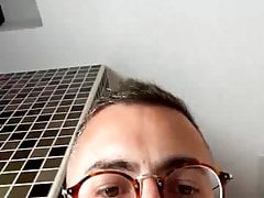 Guy with glasses cumming in the bathroom