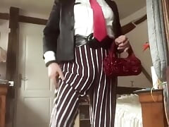 In uniform with striped pants