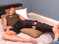 Injured faggot jock gets more than a foot touch