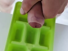 Faggot has fun with frozen cum