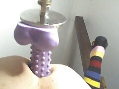 Anal fucking machine with 9 inch hedgehog dildo
