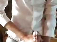 Suited gay cums a lot