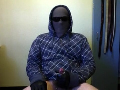 Jerk-off in hood, jacket, and gloves 6