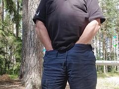 Outdoors with trafic in background chris show cock