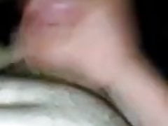 Masturbating