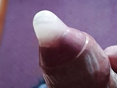 Wanking into condom
