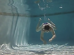 Purple bikini in the pool