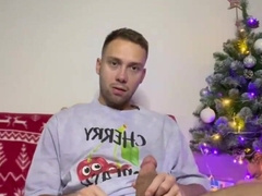 A young boy plays with his gigantic enormous fuck-stick and blows a load