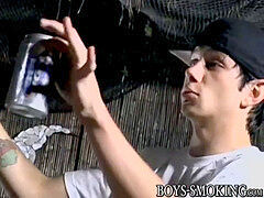 Cigar loving young men draining off rigid until a spraying end