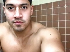 Cute colombian beefy guy flexing & showing off in shower