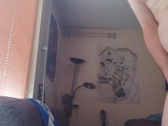 Masturbating standing for the window
