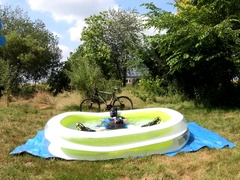 Cyclist Pup in Pool - Cooling down and Fumbling off