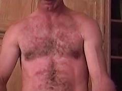 Hairy older bear likes to cup his balls while stroking his meat