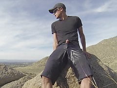 Pissing in black shorts while driving and hiking