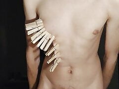 Masturbating with clothespins