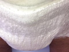 Pissing thru my wet panties into a diaper