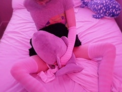 Girly boy adores playing with her shark toys