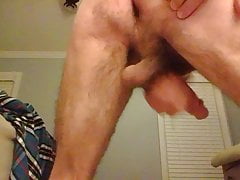 Rear view of wank - swinging balls and ass