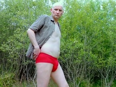 British guy Jonathan Naked strips down outside to flaunt his smooth little manhood