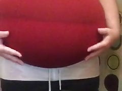 Big belly in tight clothes (padding)