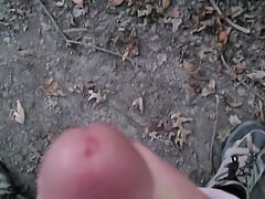 Horny college boy strokes his smooth cock to a big orgasm on his morning hike.