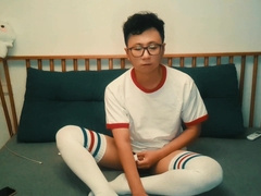 Men in white socks flash themselves to the camera