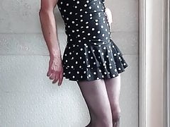 Transvestite dancing in swimsuit