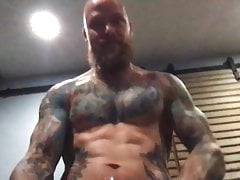 tatted bearded muscle daddy pumps out a load