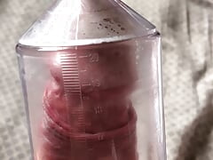 Filling up the penis pump.