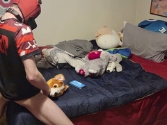 Cute twink plays with plushie while watching gay porn and indulging in self-pleasure