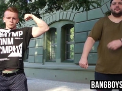 Burly deviant flexing alongside hunk before battle