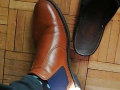 Chelsea boots, slippers and socked feet