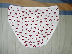 Cumshot in heart-printed panty