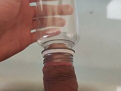 Amateur pissing in a bottle