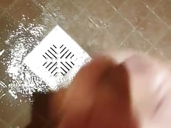 Chubby guy wanking and cumming in the shower